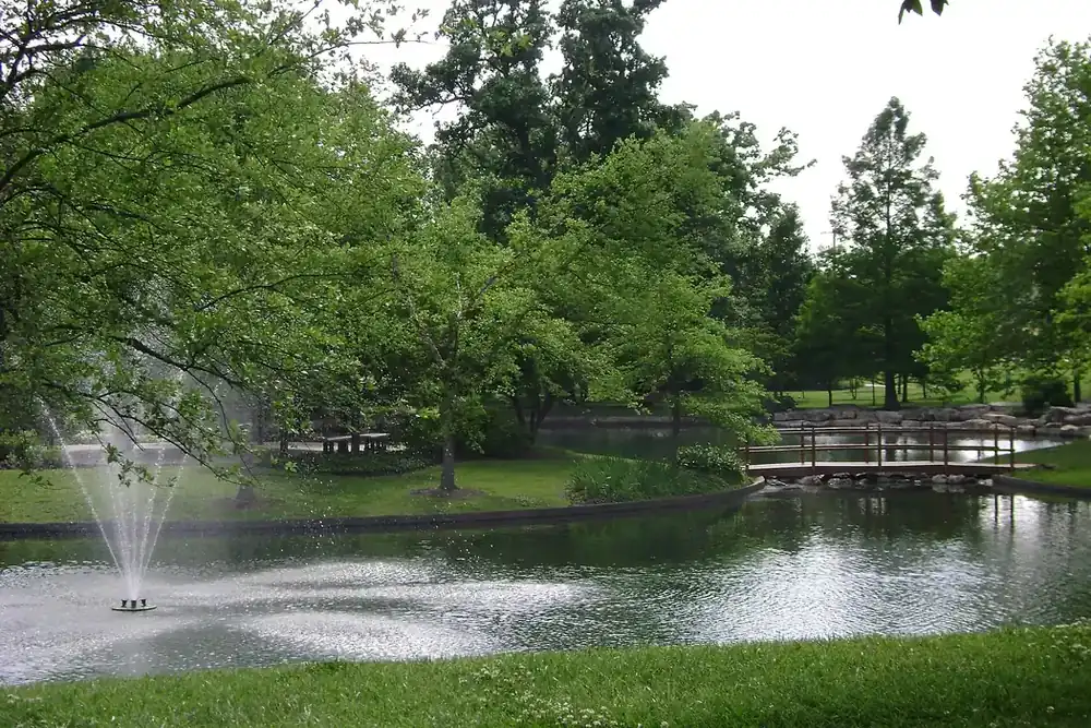 A fountain spraying in the pond at City Centre Park in St. Peters, Missouri